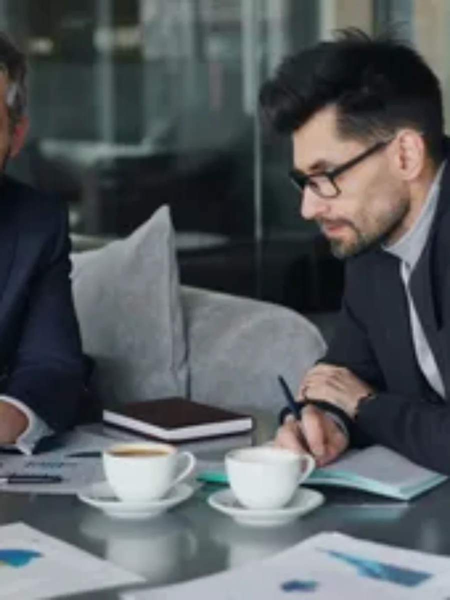 Smiling male lawyer with glasses For the page: Lawyer New 1. Use realistic, professional photography. Match the composition, crop, and visual role of the mockup