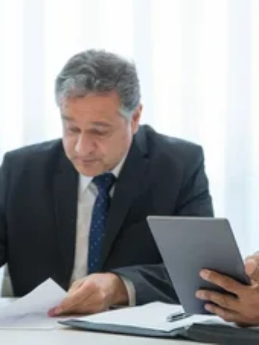 Male lawyer in navy suit with tie For the page: Lawyer New 1. Use realistic, professional photography. Match the composition, crop, and visual role of the mocku