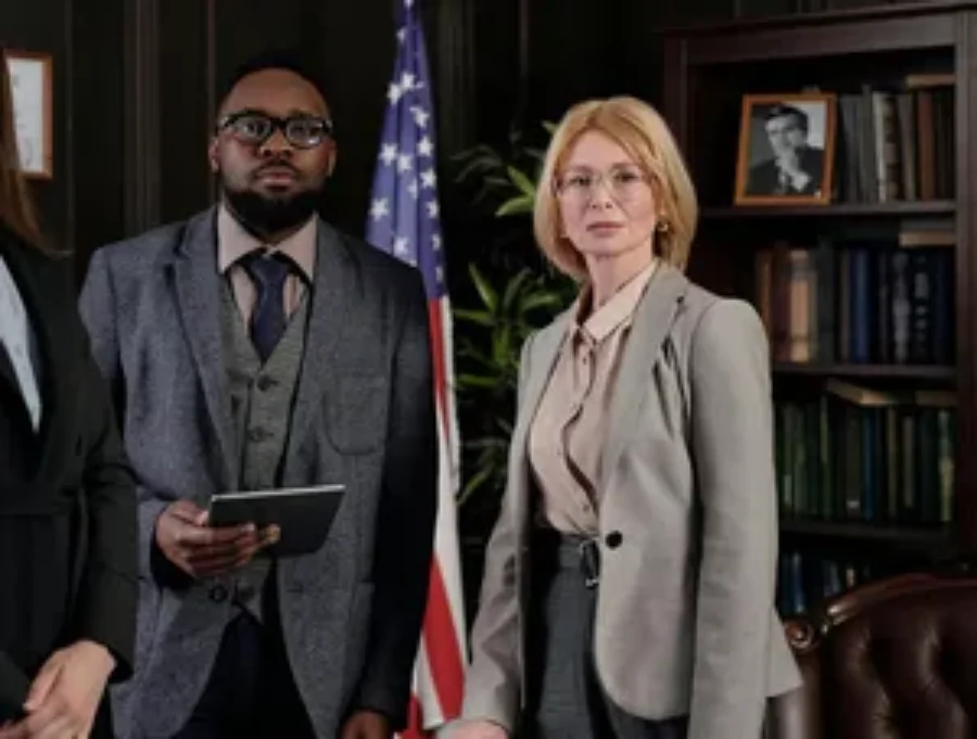 Female attorney in suit For the page: Lawyer Claude 3. Use realistic, professional photography. Match the composition, crop, and visual role of the mockup regio