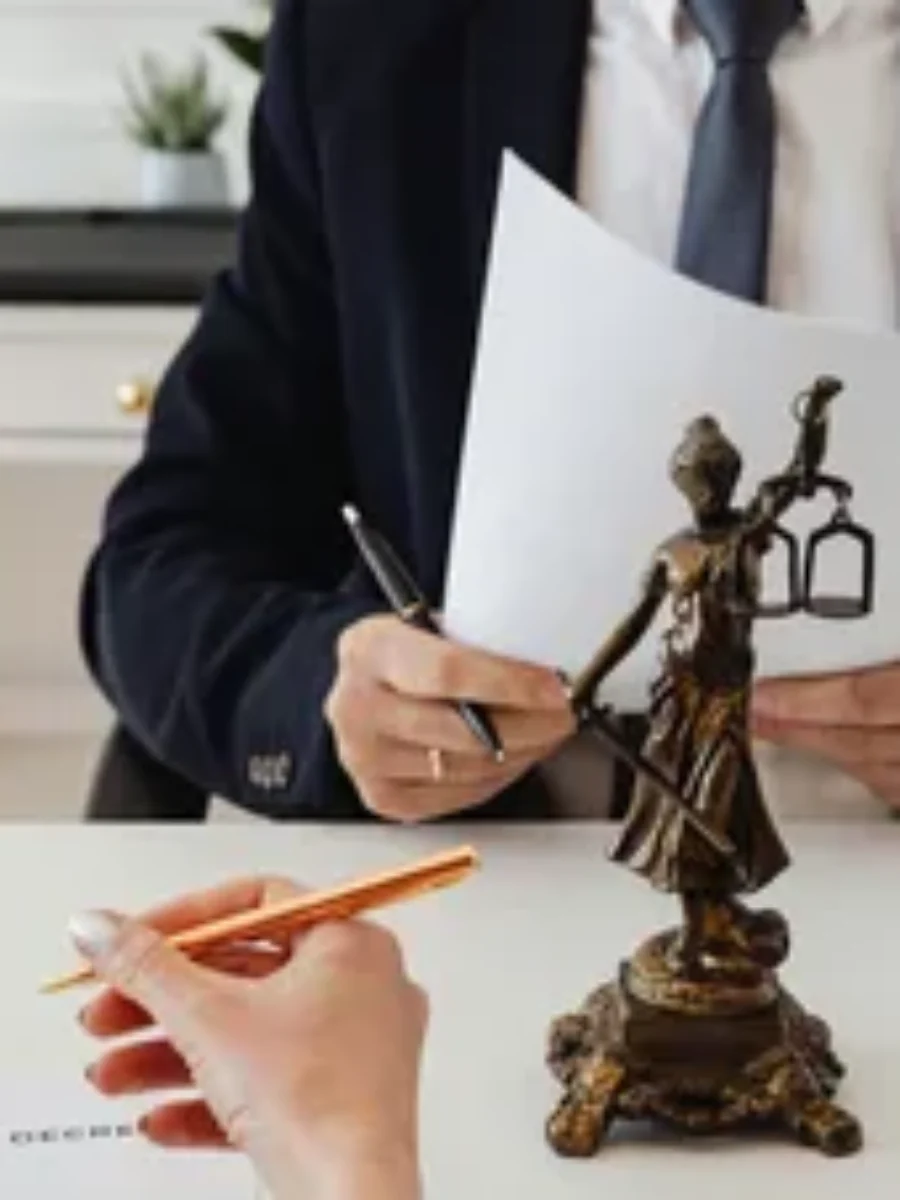 Female senior lawyer in grey blazer For the page: Lawyer New 1. Use realistic, professional photography. Match the composition, crop, and visual role of the moc